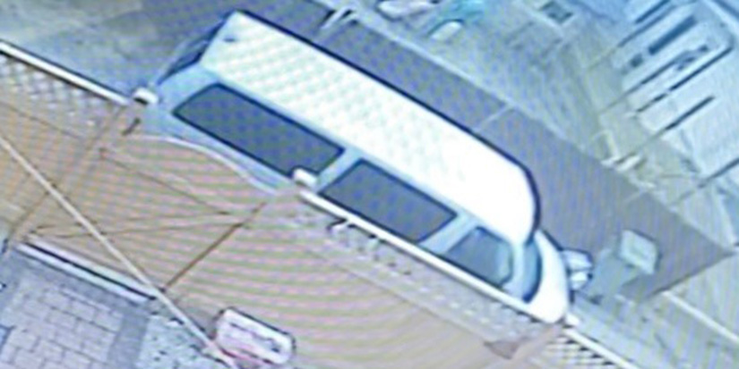 Man in van approaches boy offering candy