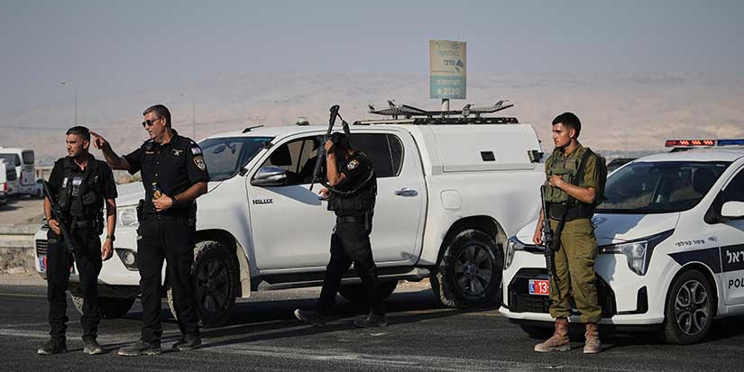 Gunman kills 2 at Israeli-run crossing between West Bank and Jordan. 4 soldiers killed in Gaza